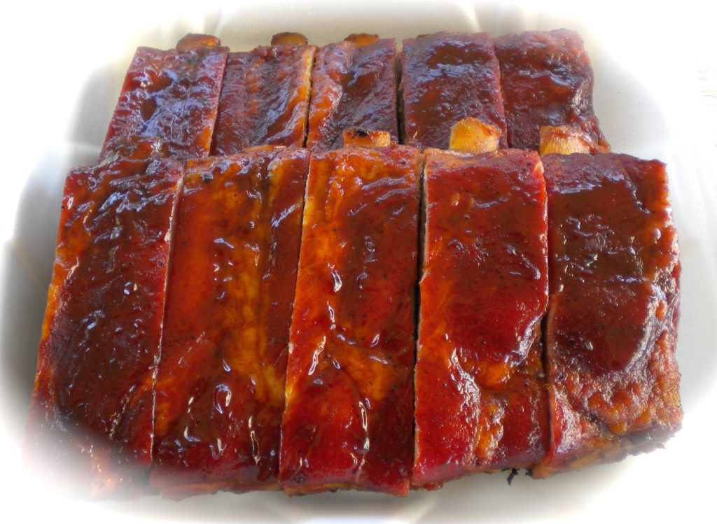 Pork ribs drenched in sauce.