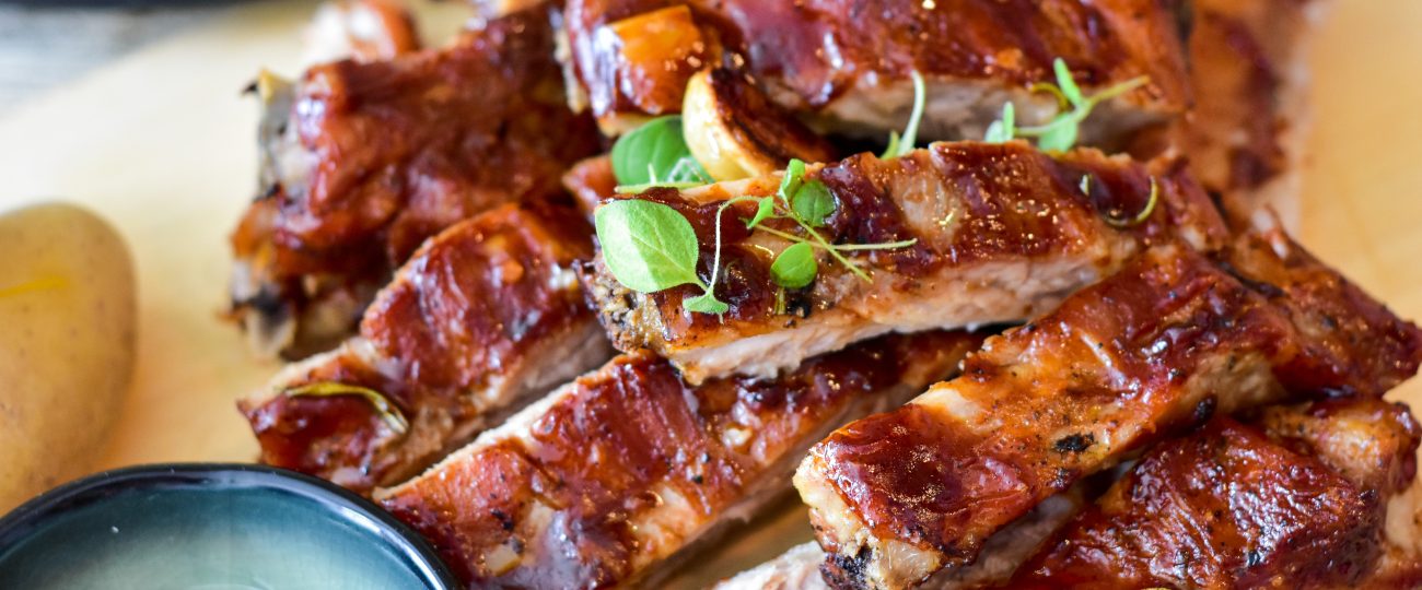 Pork ribs served at the table.