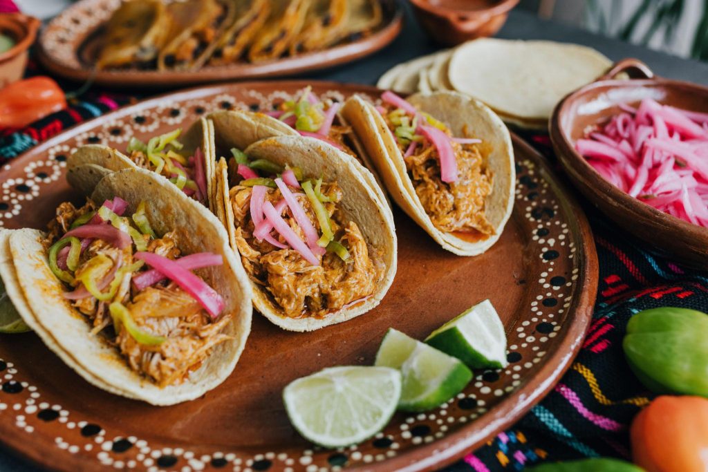 Mexican tacos with lemon and salsa, traditional Mexican food in Mexico city